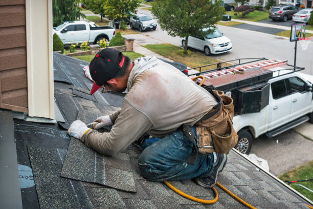 Professional Roofing technician working in Sterling, CT